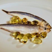 photo of fresh fish + vitamin e capsules